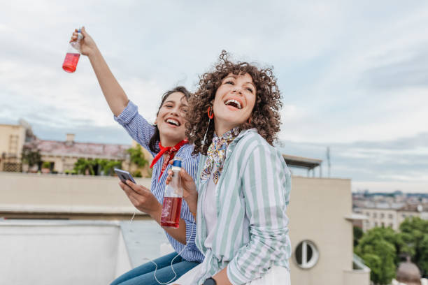 istock Best friends spend time together on the rooftop 1368065807