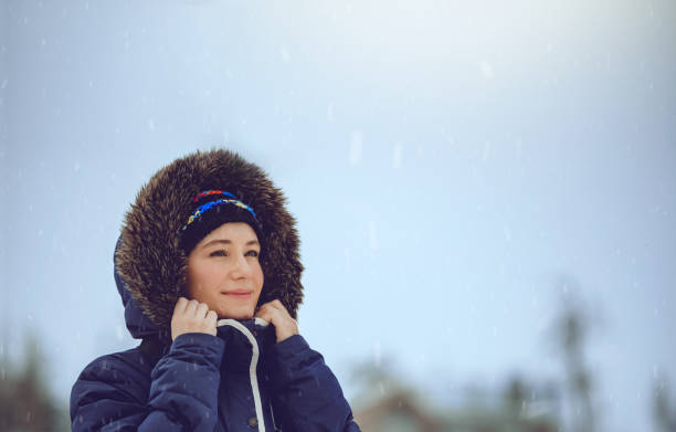 istock Pretty Woman Enjoying Winter 1368066842