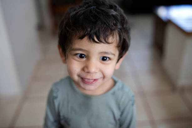 Toddler smiling at home