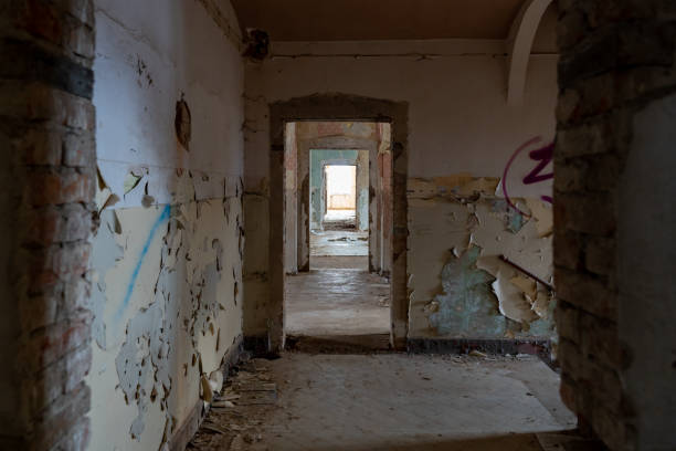 istock Dark Corridor in an Abandoned Building 1368071763