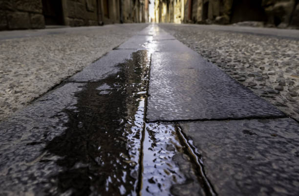 istock Old wet town street 1368071990