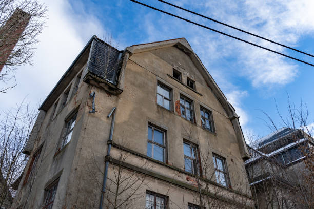 istock Abandoned Building with a Damaged Facade 1368073224