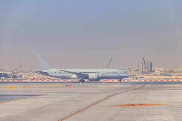 istock Airplane on runway in Doha airport, Qatar 1368073488