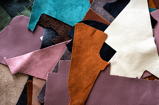 Pieces of multicolored leather, shoemaking, patchwork.
