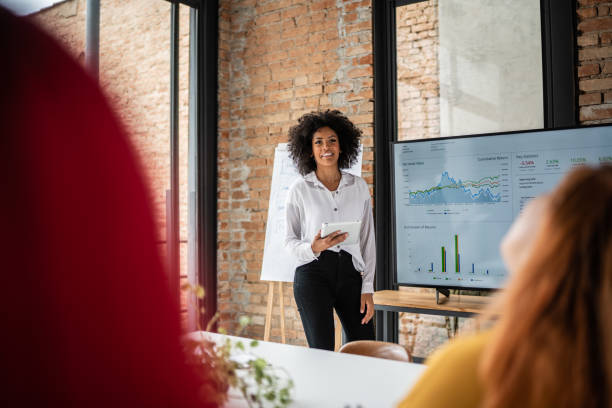istock Businesswoman doing a presentation in the conference room 1368075558