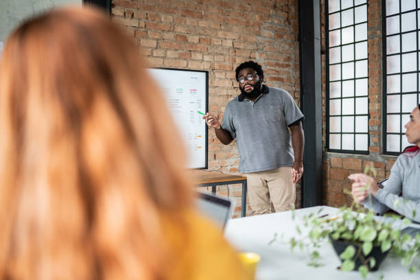 istock Businessman doing a presentation in the conference room 1368076408
