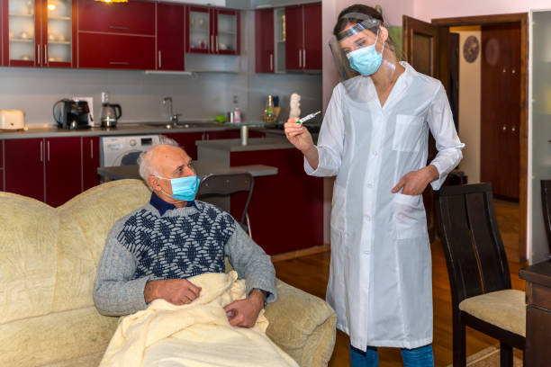 istock Home visit to a doctor for examination and vaccination 1368081521