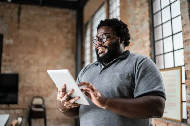 Business man using digital tablet in an office