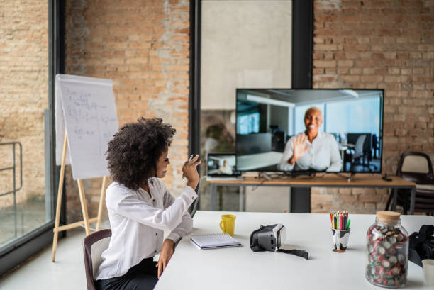 istock Business women doing a video conference in the office 1368085042