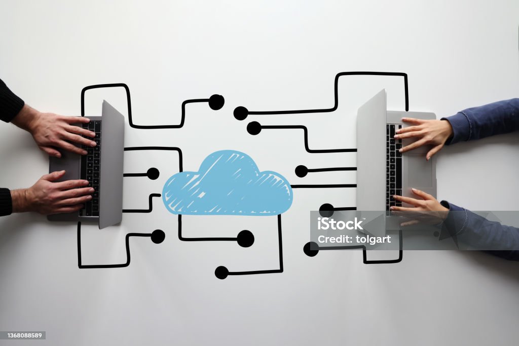 Cloud computing concept Business people using laptop with cloud computing icon Exchanging Stock Photo
