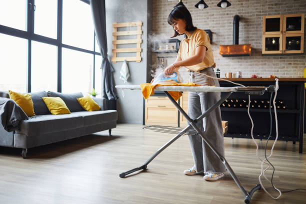 istock Young Woman doing Chores 1368091436