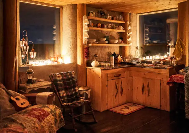 Photo of Interior of an eco cabin at night