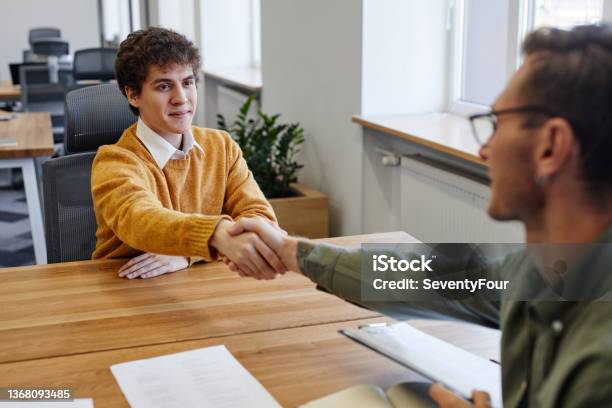 Successful Job Interview Stock Photo - Download Image Now - Job Interview, Trainee, Young Adult