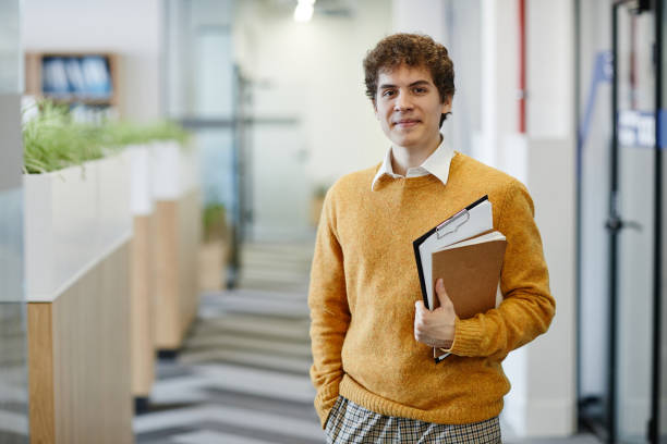istock Smiling Young Employee in Office 1368093486