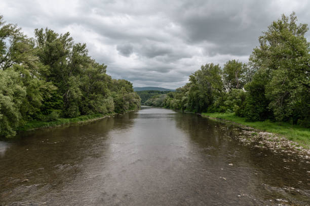 Landscape of nature with mountain river and cloudy sky