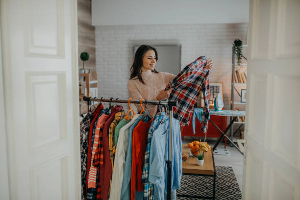 istock Young woman choosing clothes 1368095976