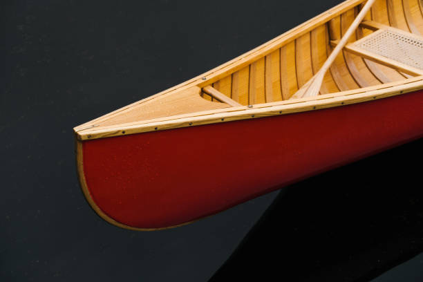 Bow (nose) of a red canadian canoe.