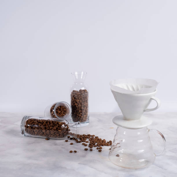 v60 coffee brewing funnel with coffee beans