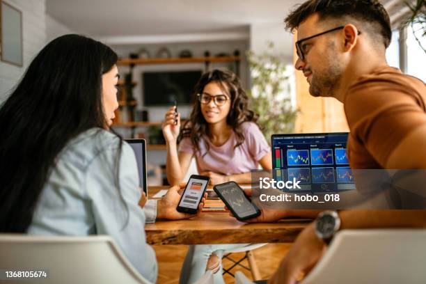 Investing Cryptocurrency Using Smart Phone Apps Stock Photo - Download Image Now - Cryptocurrency, Buying, Business