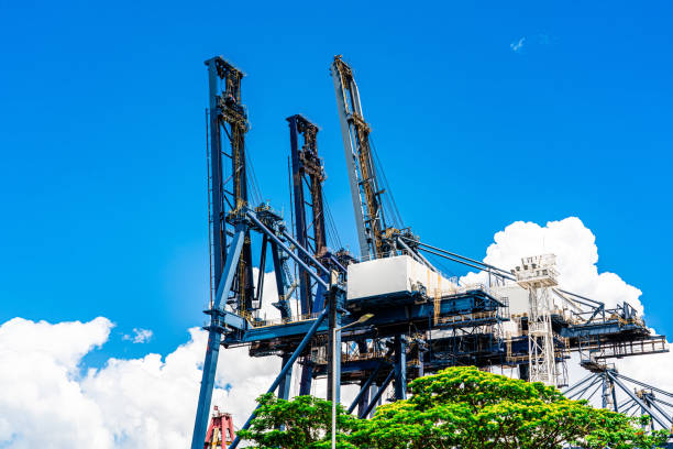 Sagunto, Valencia, Spain- February 8, 2025: Cranes working at the Port of Sagunto
