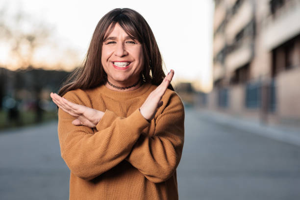 break the bias feminism campaign fighting for equality and diversity. transgender woman gesture stock photo