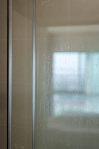 istock Rain droplets on window with out of focus background 1368111601