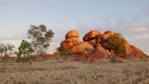 istock sunset shot of the devil's marbles in the northern territory 1368115434