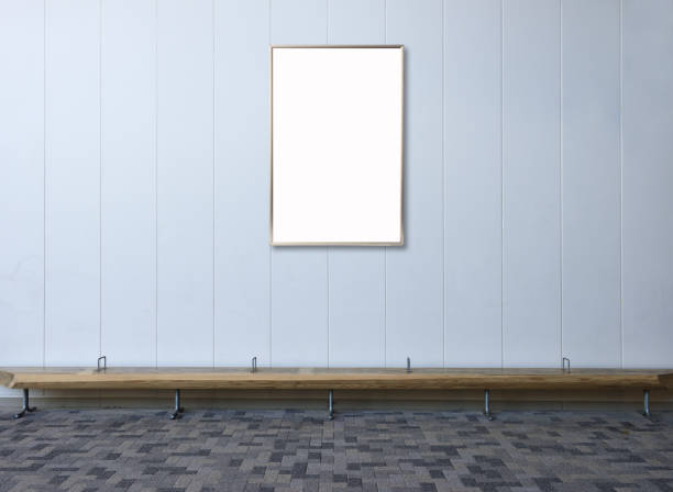 istock One blank bulletin board in the aisle with empty wooden bench 1368124974