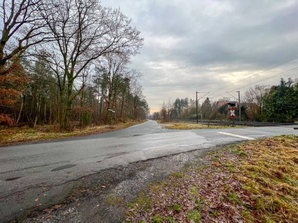 istock A road junction at the railway tracks in Germany. 1368127482