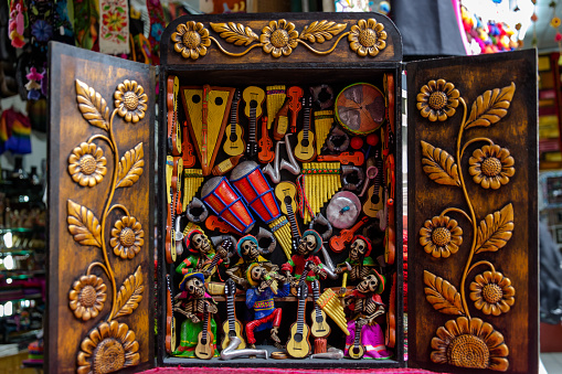 Retablos are a sophisticated Peruvian folk art in the form of portable boxes which depict religious, historical, or everyday events that are important to the Indigenous people of the highlands. It is a tradition originated in Ayacucho. Source Wikipedia.