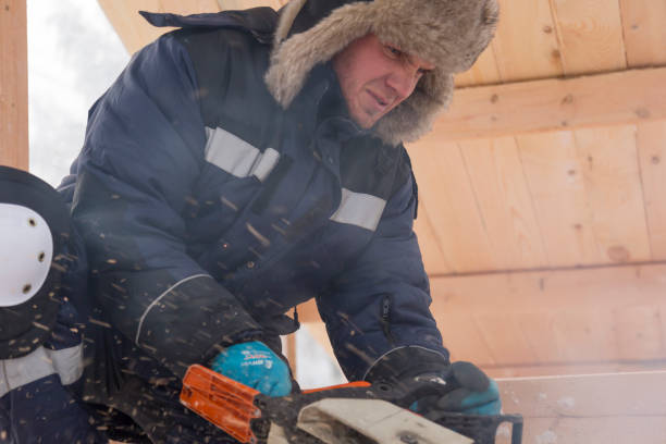 istock Worker assembling the frame of a wooden slide 1368130754