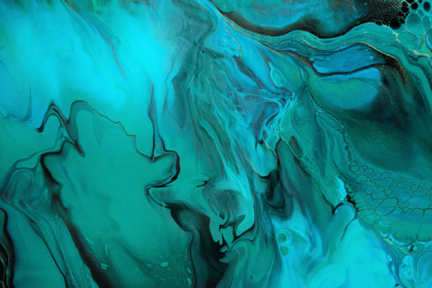 istock Fluid Art. Green and blue abstract wave swirls on black background. Marble effect background or texture 1368133503