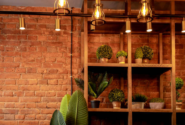 istock Stylish loft interior. Brick wall in a cafe. Copy space 1368133638
