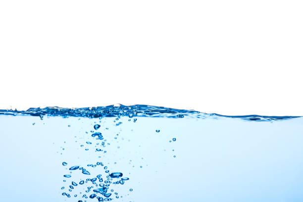 istock Light blue water wave with air bubbles and a little bit splashed underwater 1368136362