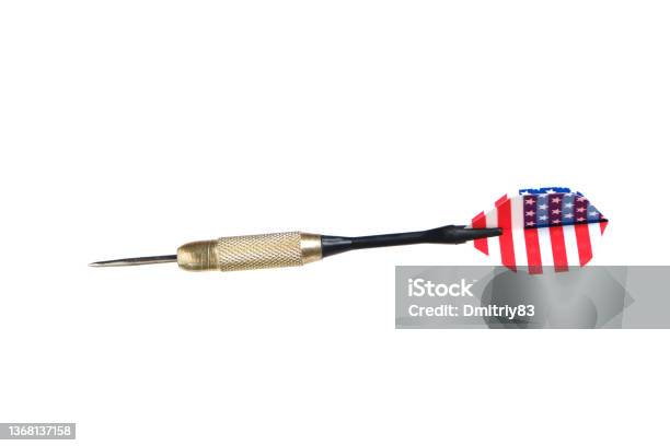 Metal Dart For Playing Darts With Color Plumage Under Us Flag On White Background Stock Photo - Download Image Now