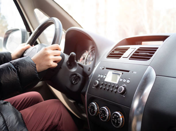 hand holding a steering wheel driving - car driver bildbanksfoton och bilder