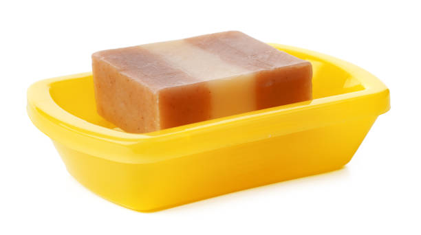istock Soap on a plastic soap dish isolated on a white background 1368141832