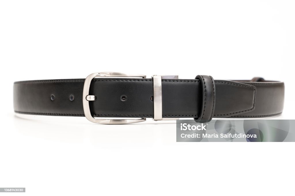 black leather belt on a white background. black leather belt on a white background. accessories store for men Waistband Stock Photo