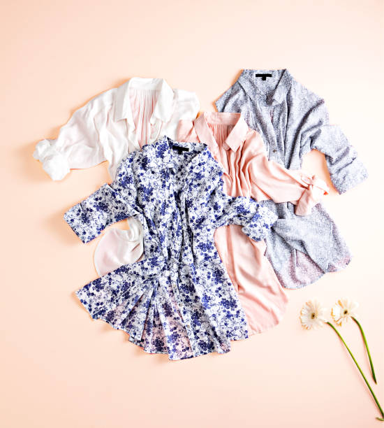 istock Fashionable shirts with flowers on white background 1368144552