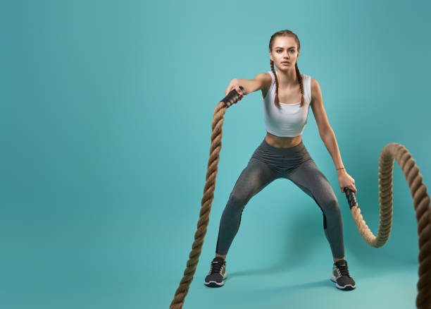 istock woman doing gym exercises 1368146538