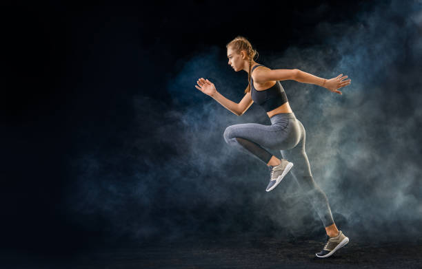 mädchen joggt - fashion model beautiful power action stock-fotos und bilder