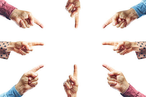 Human hands with finger pointing up. Hands of women and men touching or pointing to something isolated on white background. Close up. High resolution