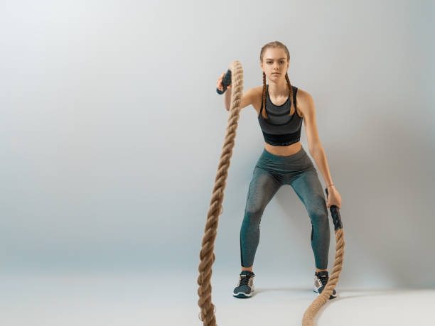 istock woman doing gym exercises 1368146613