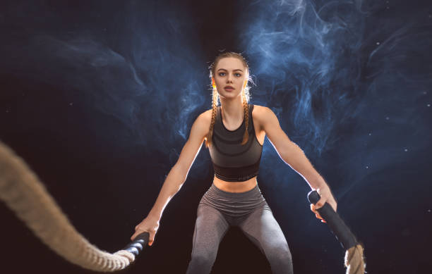 istock woman doing gym exercises 1368146739