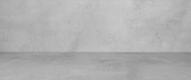 istock Empty gray concrete room and floor background, Perspective grey gradient concrete room for interior background, backdrop,  Gray grunge cement room with space for product display mockup, template 1368147792