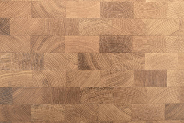 istock Wood texture background. Wooden mosaic pattern for decorating interior surfaces, floors, tables. Parquet, laminate and floor coverings. 1368150075