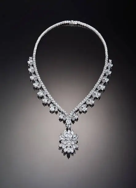 Photo of Diamond necklace on black background