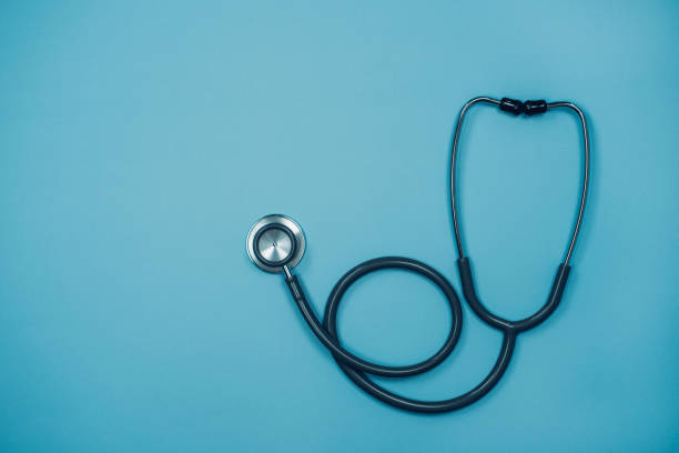 istock Stethoscope on pastel blue background with copy space, Health concept. 1368150834
