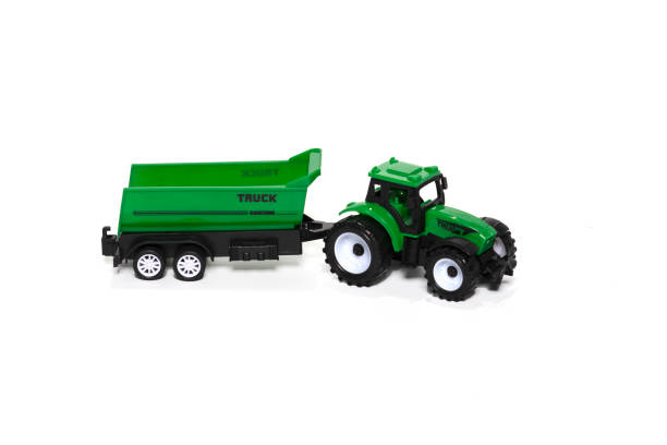 istock Toy tractor isolated on white background. 1368151317