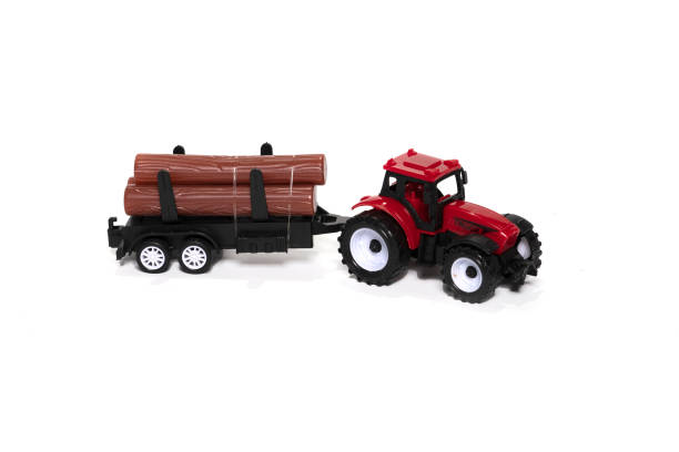 istock Toy tractor isolated on white background. 1368151349